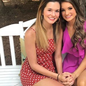 Red/orange colored polka dot dress